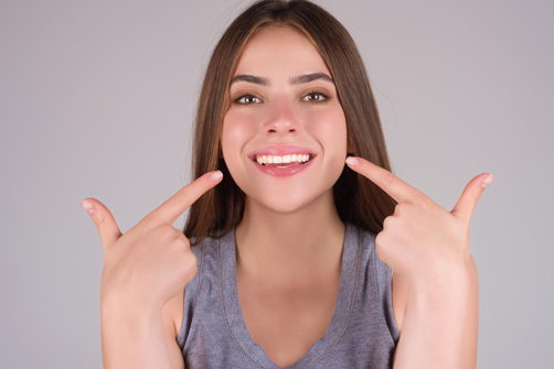 girl showing her beautiful smile